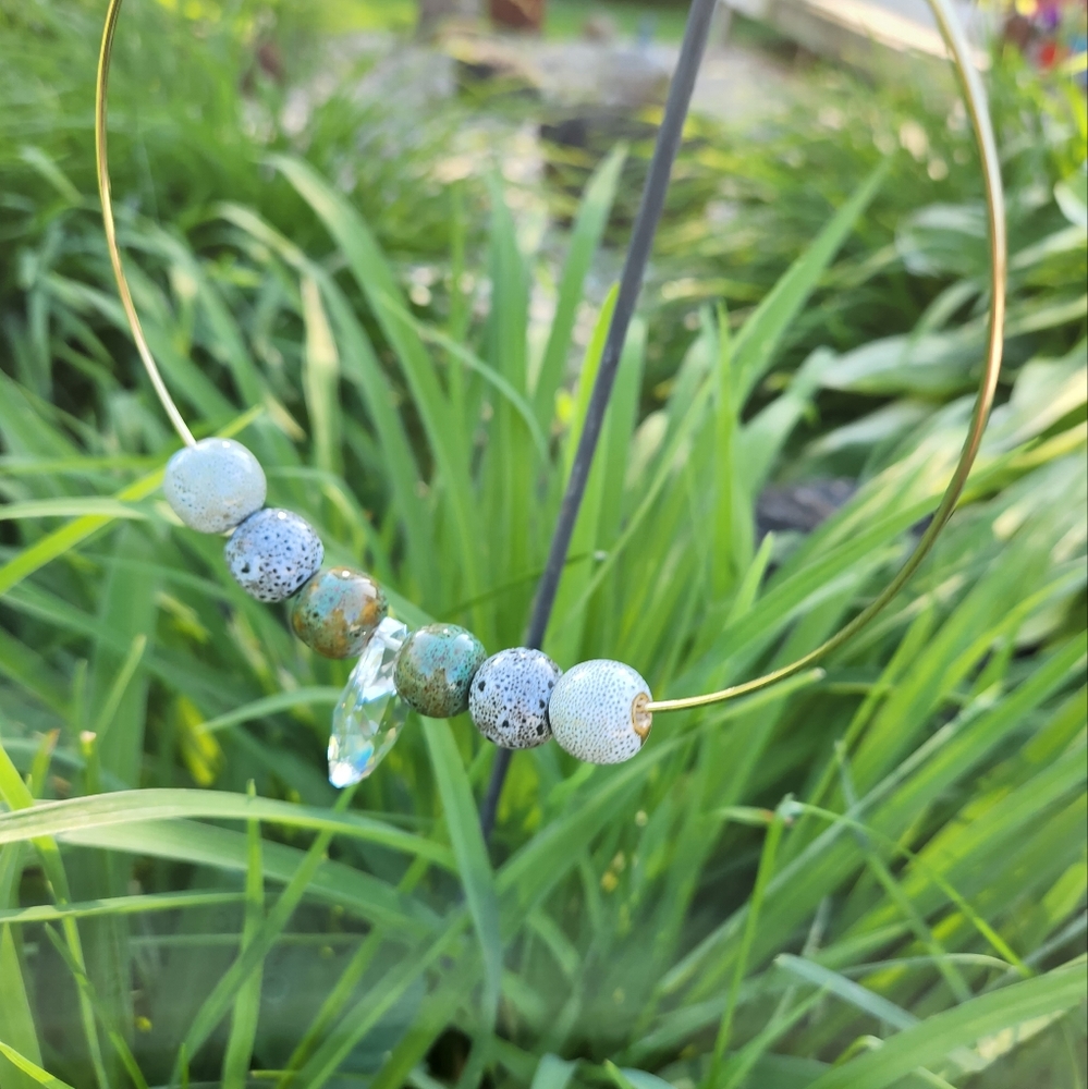 Circular hanging beaded garden Ring